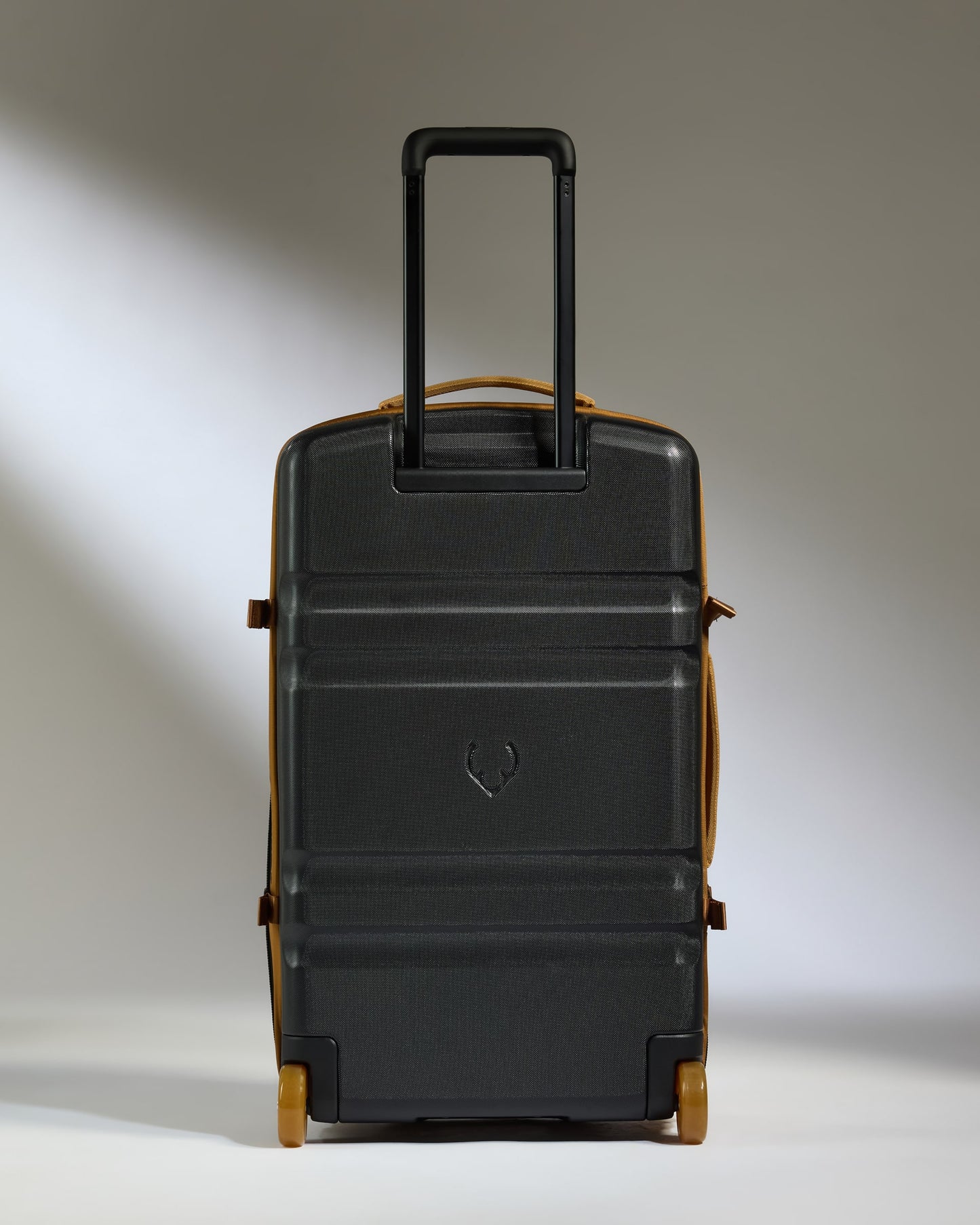 Discovery Wheeled Duffel in Mustard Yellow