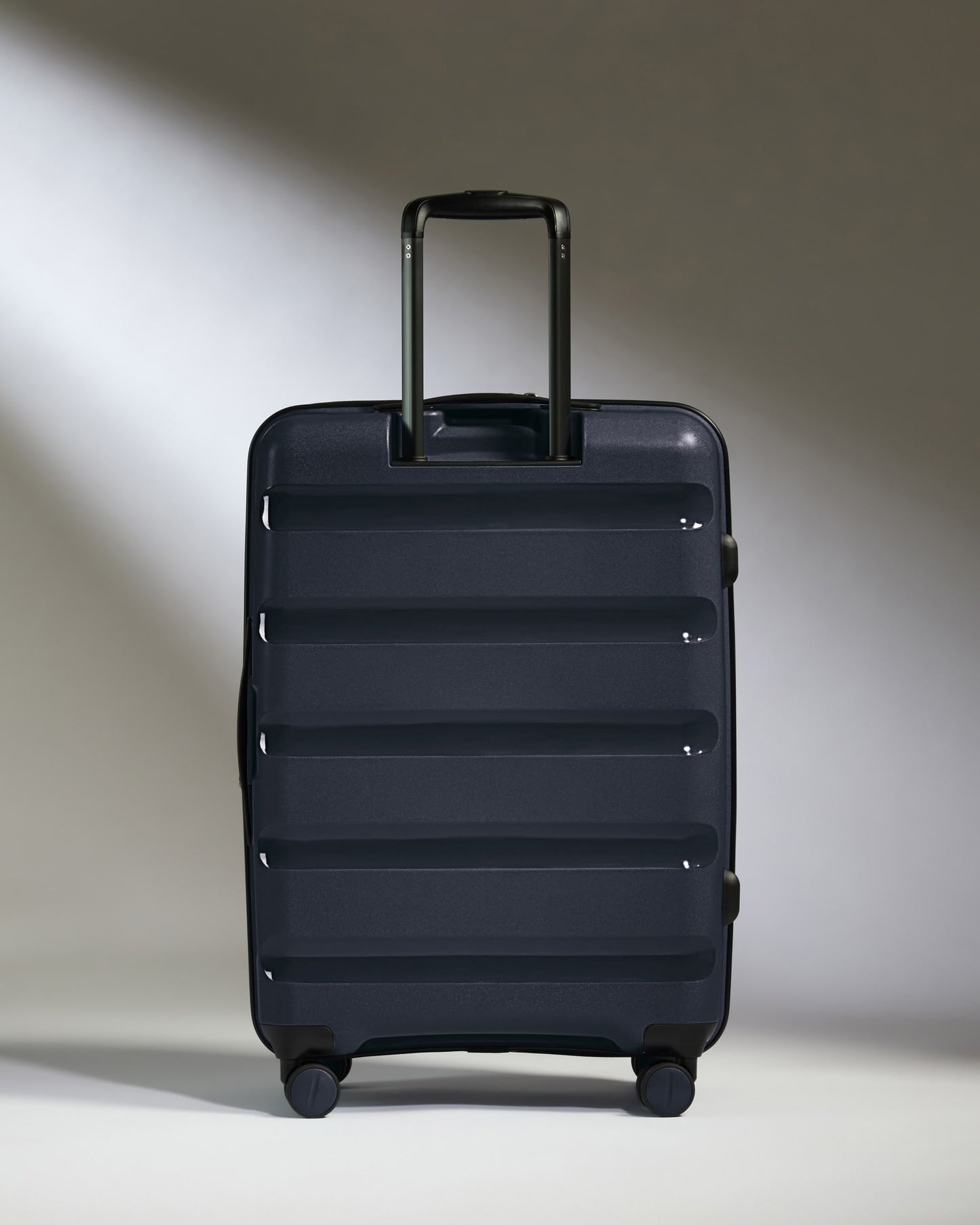 Medium Suitcase in Navy - Logo Stripe