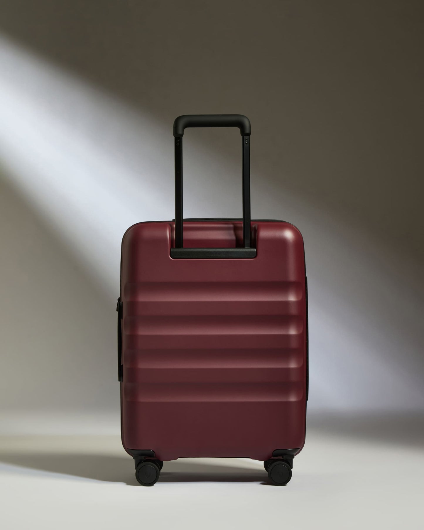 Cabin Suitcase in Cedar Red - Icon Stripe