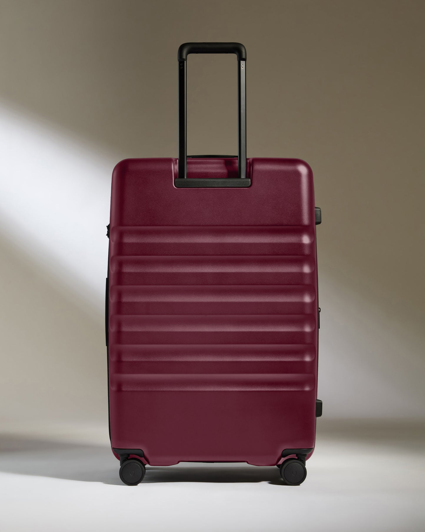 Large Suitcase in Heather Purple - Icon Stripe