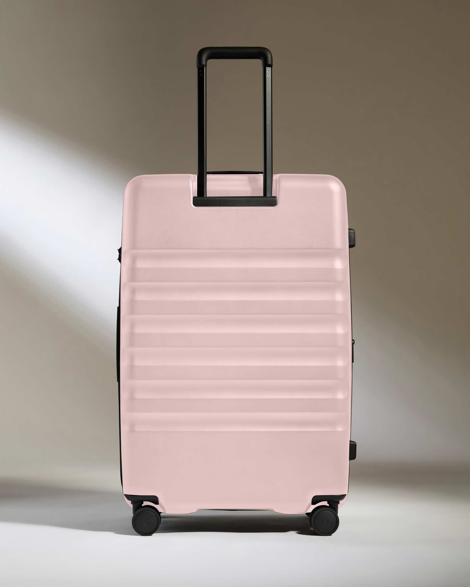 Large Suitcase in Moorland Pink Icon Stripe Lightweight Hard Shell Suitcase Antler Global