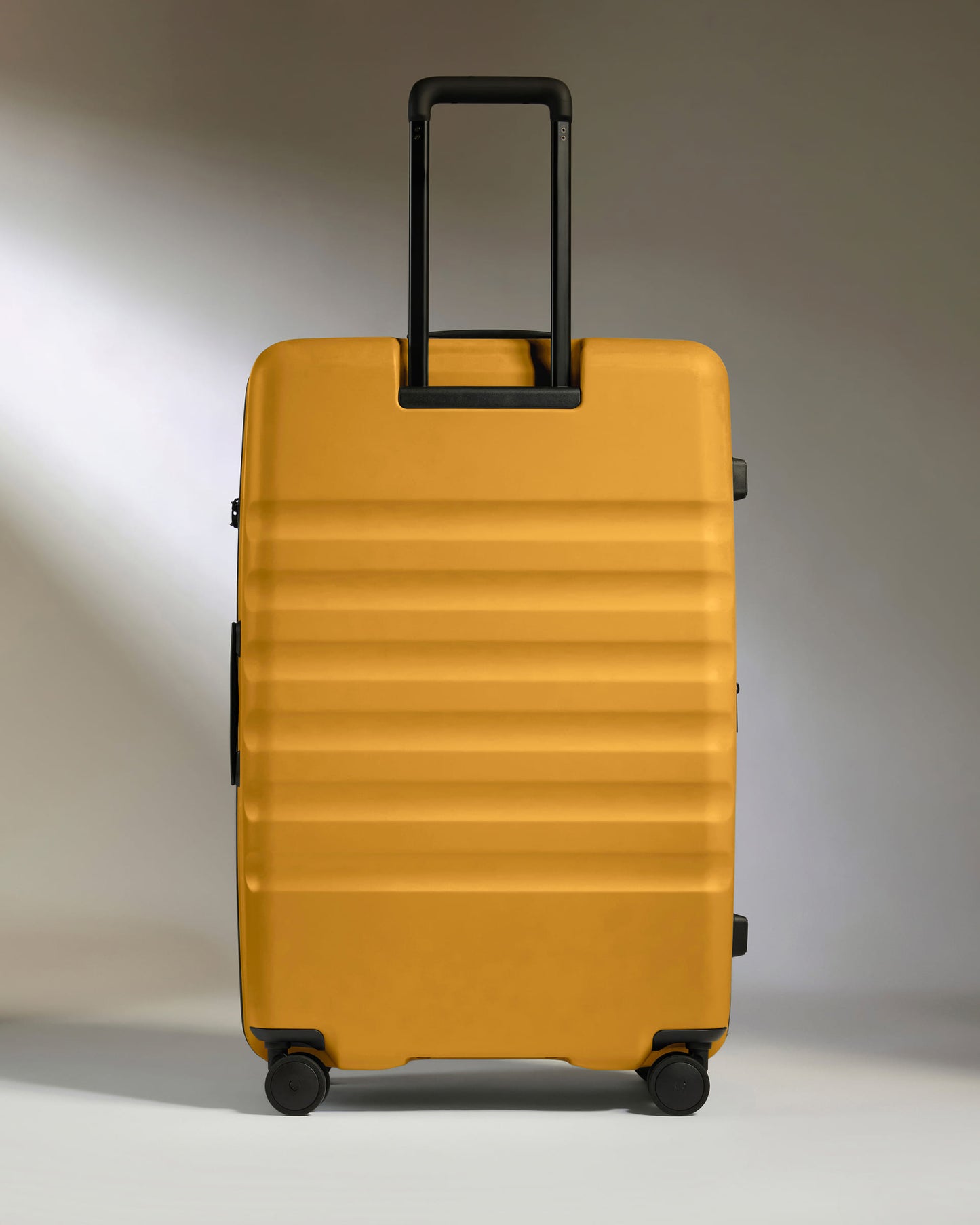 Large Suitcase in Mustard Yellow - Icon Stripe