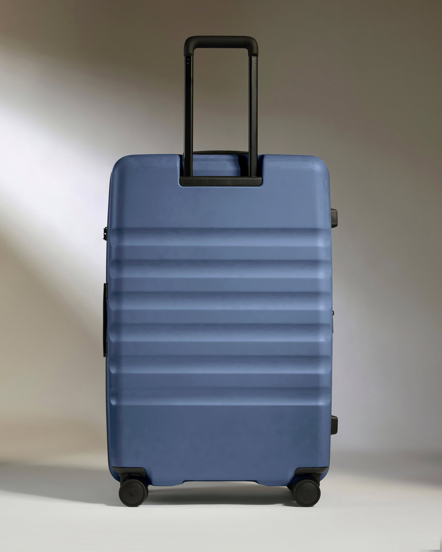 Large Suitcase in Ocean Blue - Icon Stripe