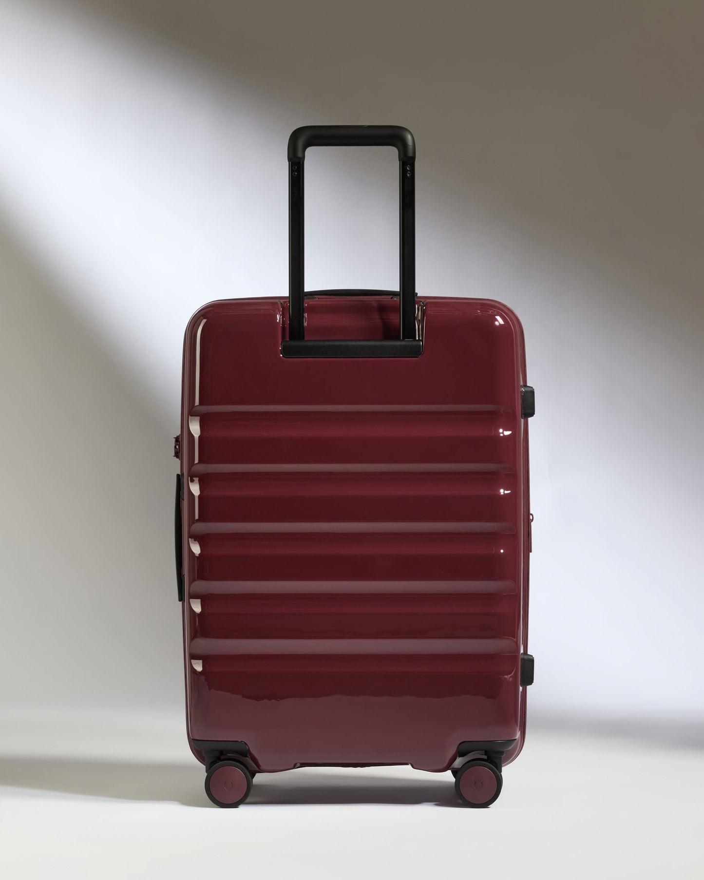 Medium Suitcase in Cedar Red Gloss - Icon Stripe