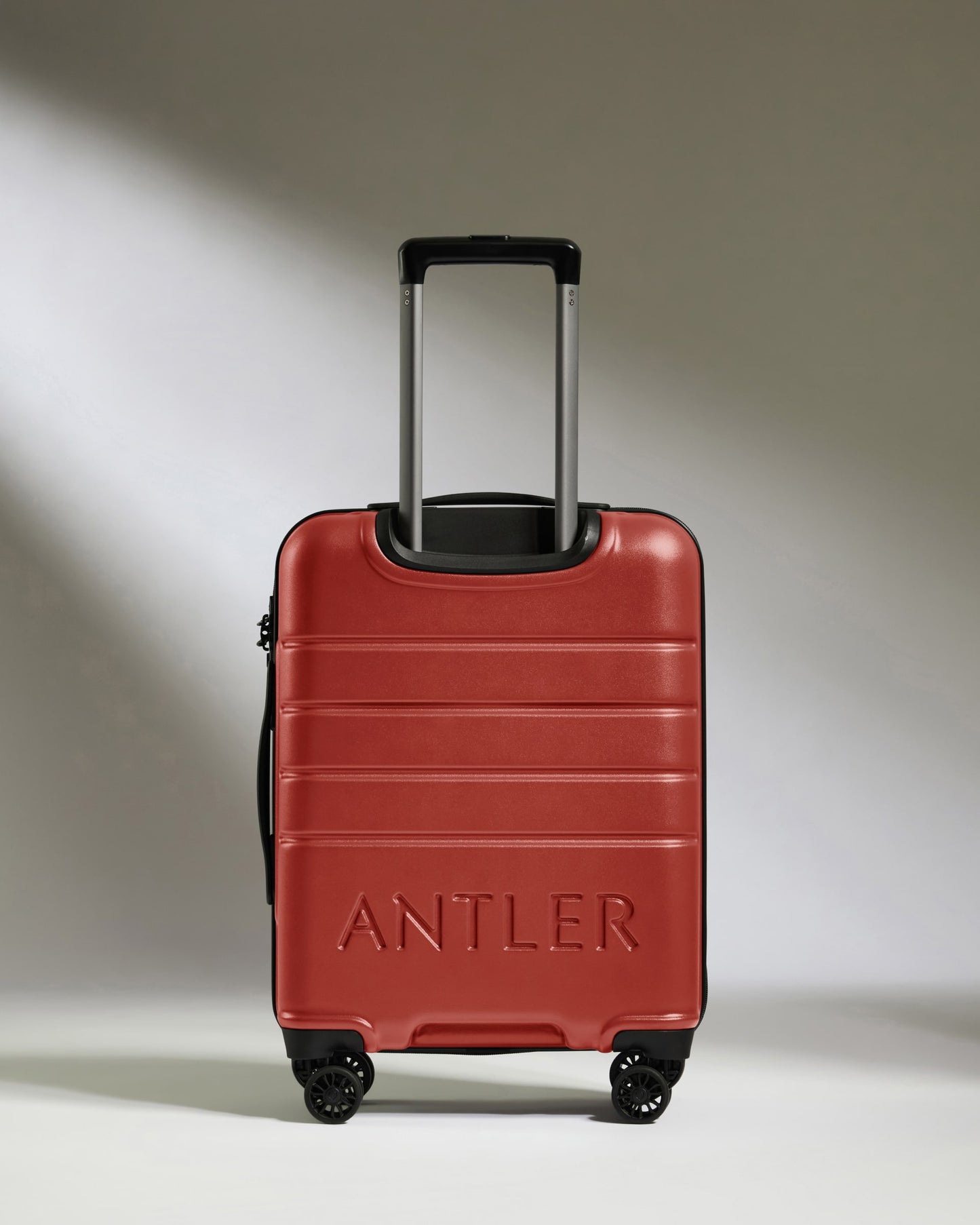 Cabin Suitcase in Red Orange - Logo