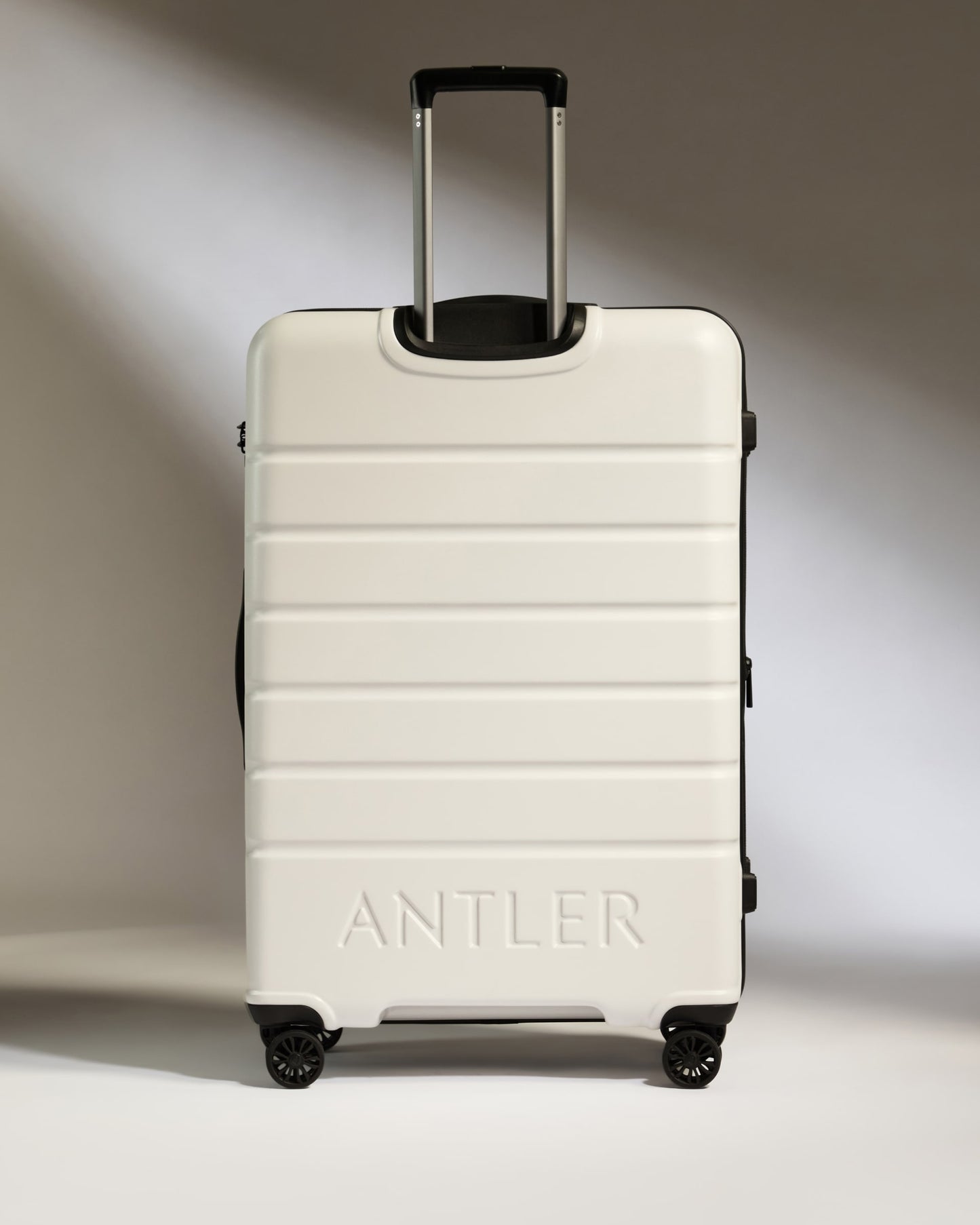 Large Suitcase in Arctic White - Logo