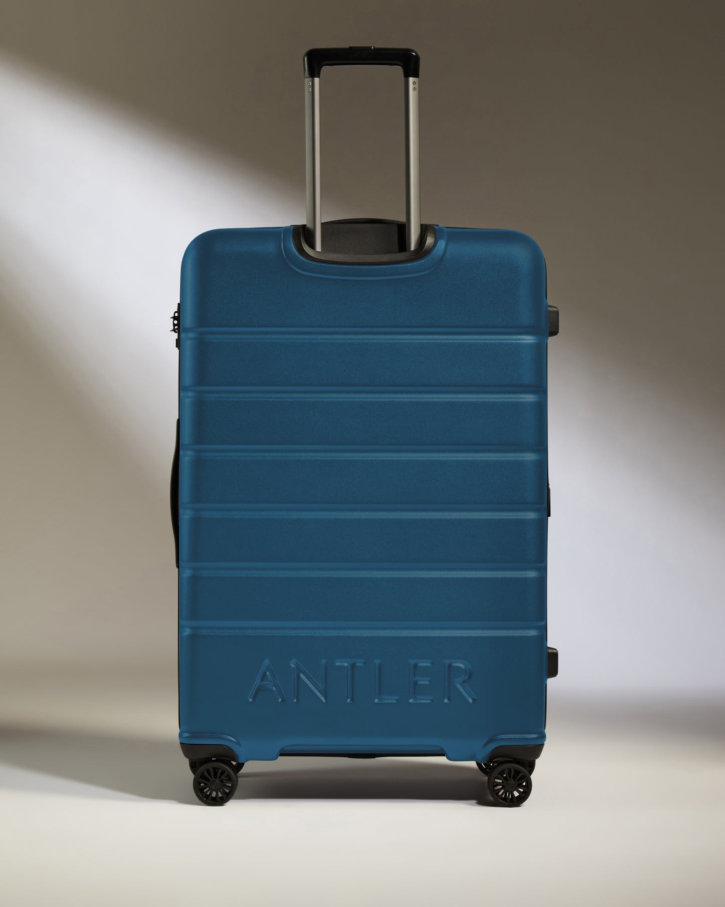 Large Suitcase in Bold Blue - Logo