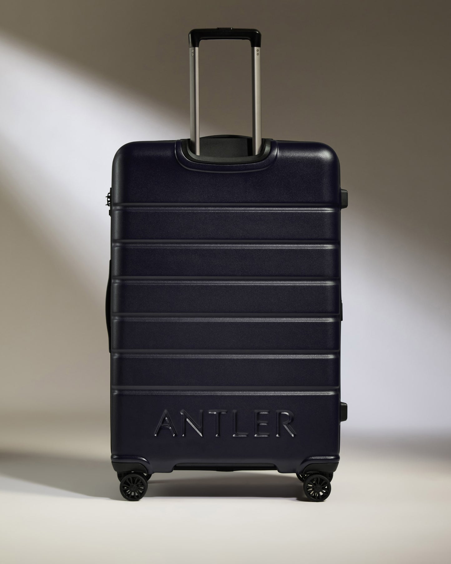 Large Suitcase in Dark Purple - Logo