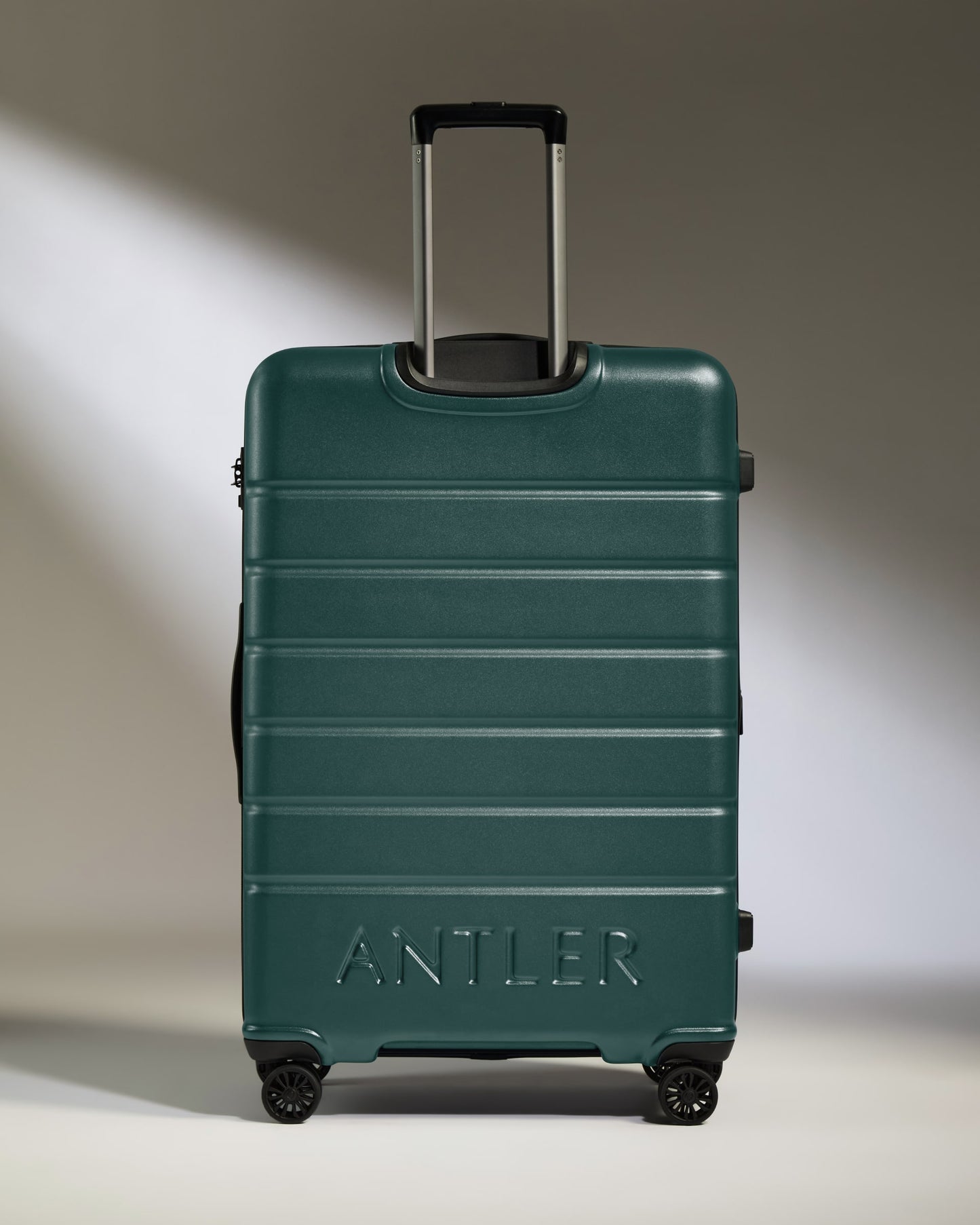 Large Suitcase in Dark Teal - Logo