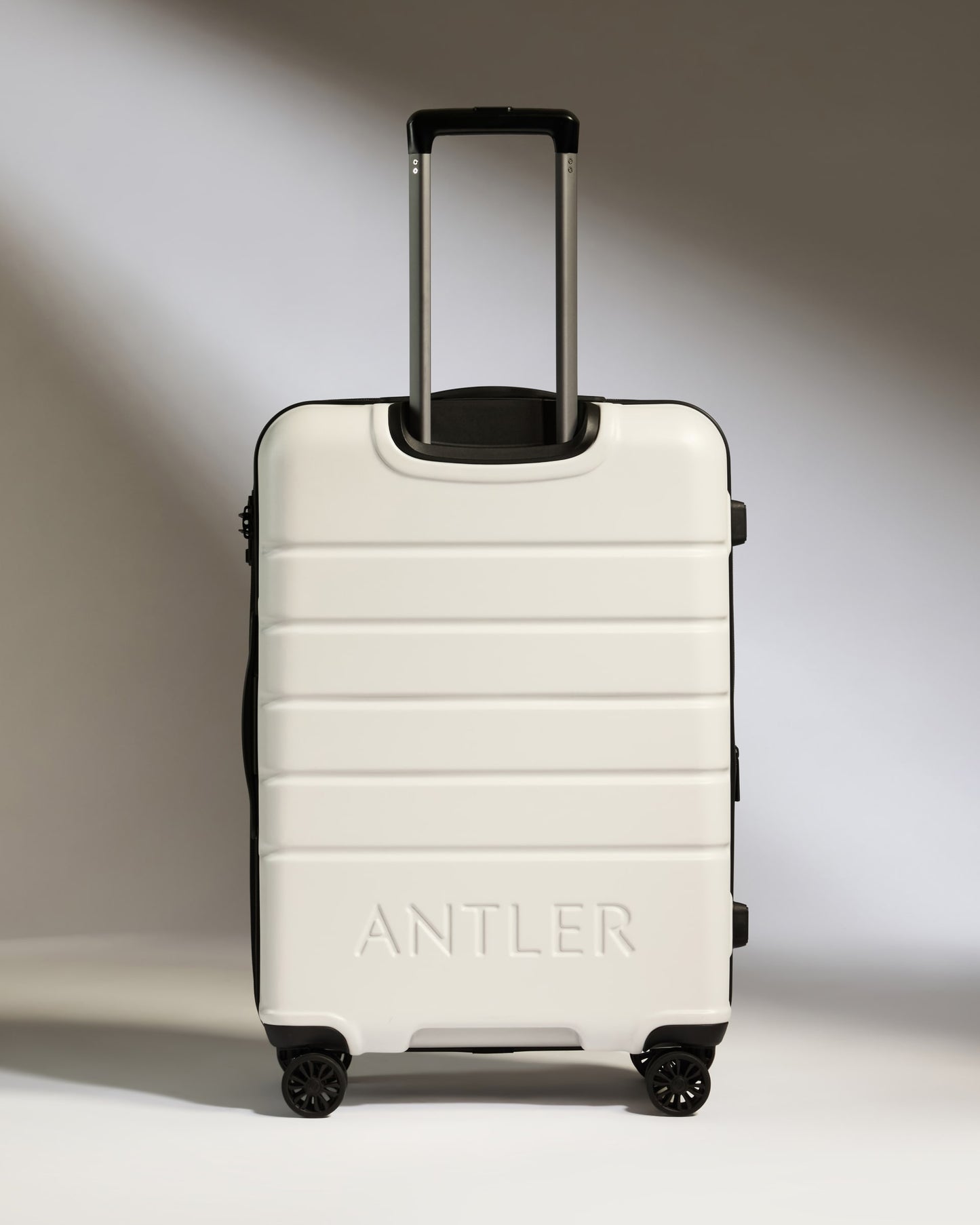 Medium Suitcase in Arctic White - Logo