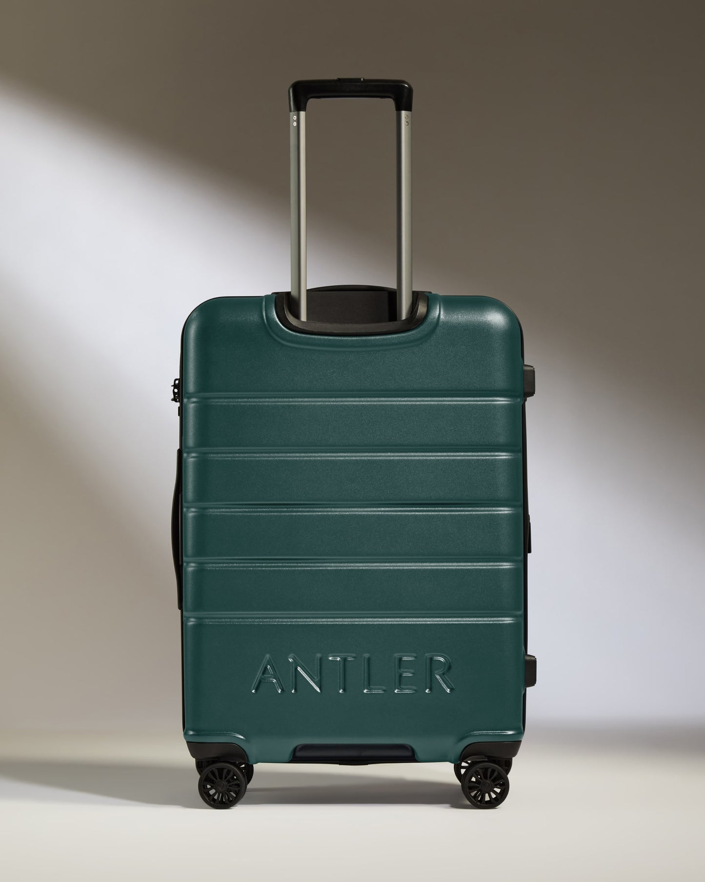 Medium Suitcase in Dark Teal - Logo