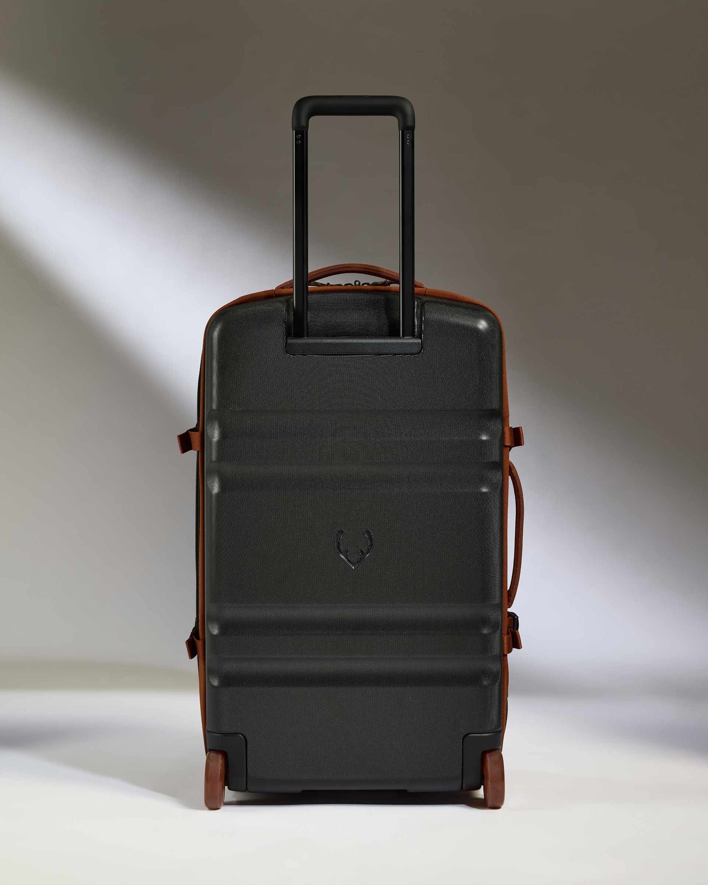 Discovery Wheeled Duffel in Clay Brown