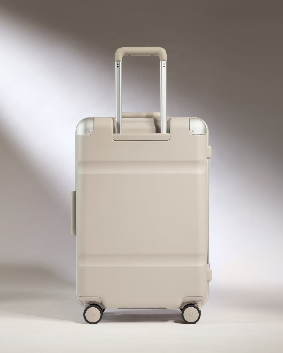 a white suitcase with wheels