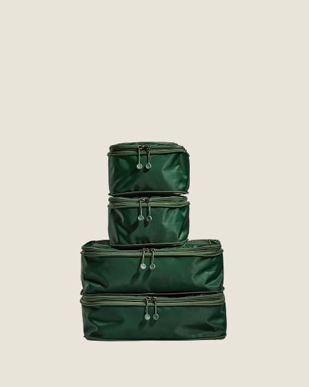 a stack of green bags