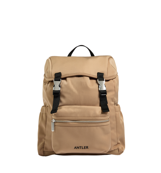 a tan backpack with black straps