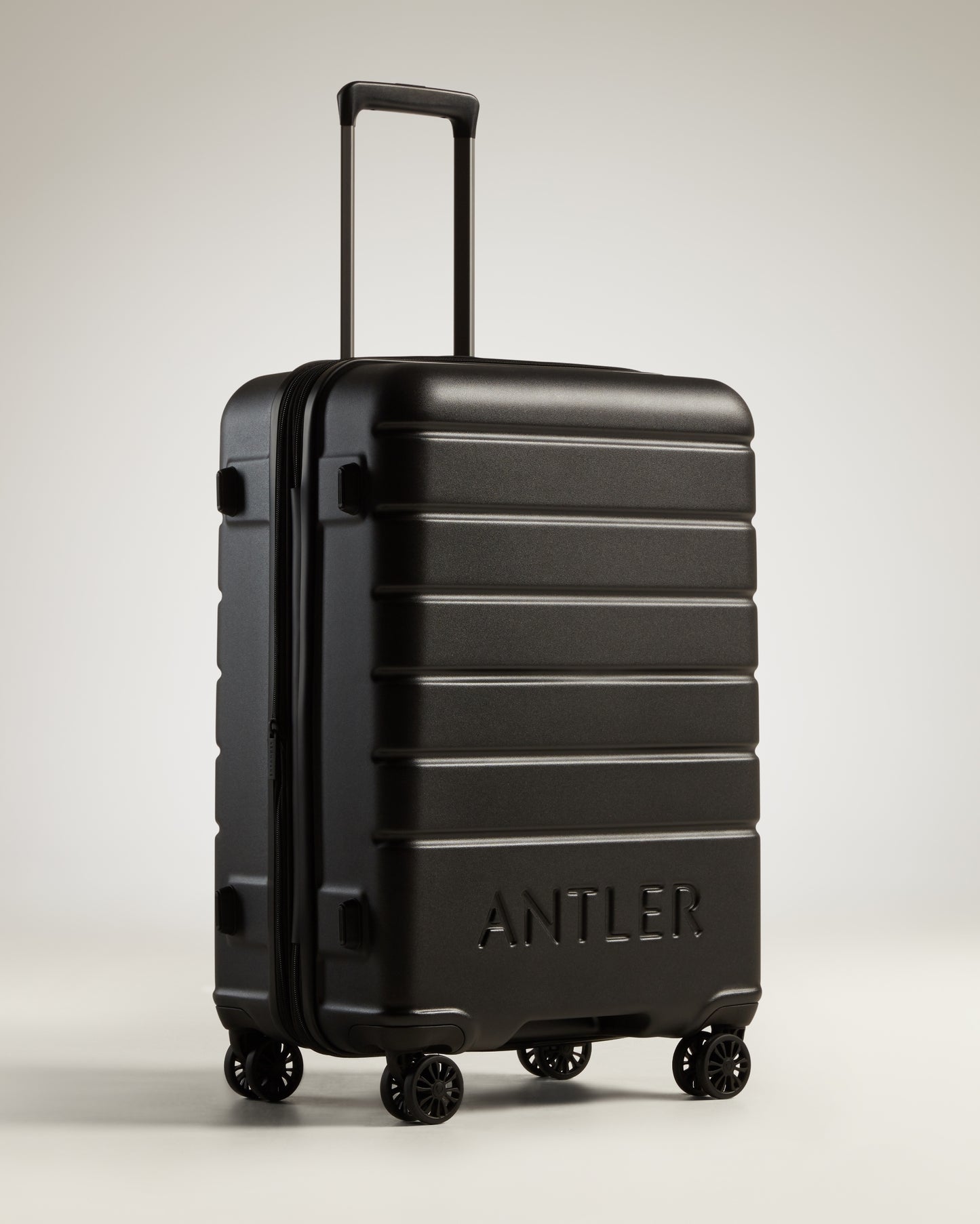 Medium Suitcase in Black - Logo