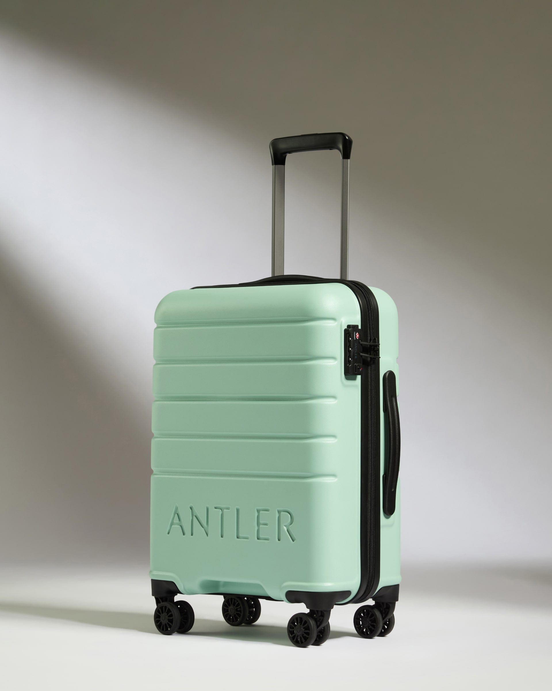 Cabin Suitcase in Aspen Green Logo