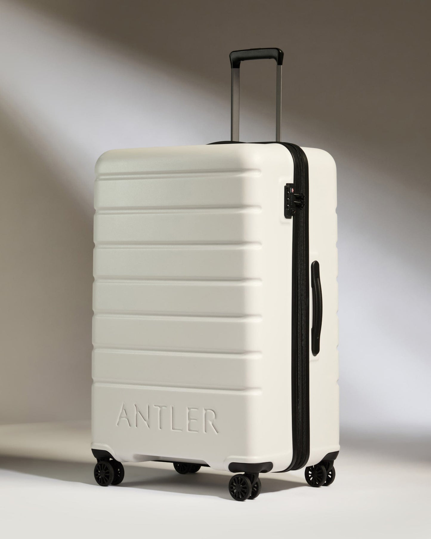 Antler Luggage -  Large Suitcase in Arctic Grey - Logo - Hard Suitcases Large Suitcase in Light Grey - Logo | Lightweight Hard Shell Luggage