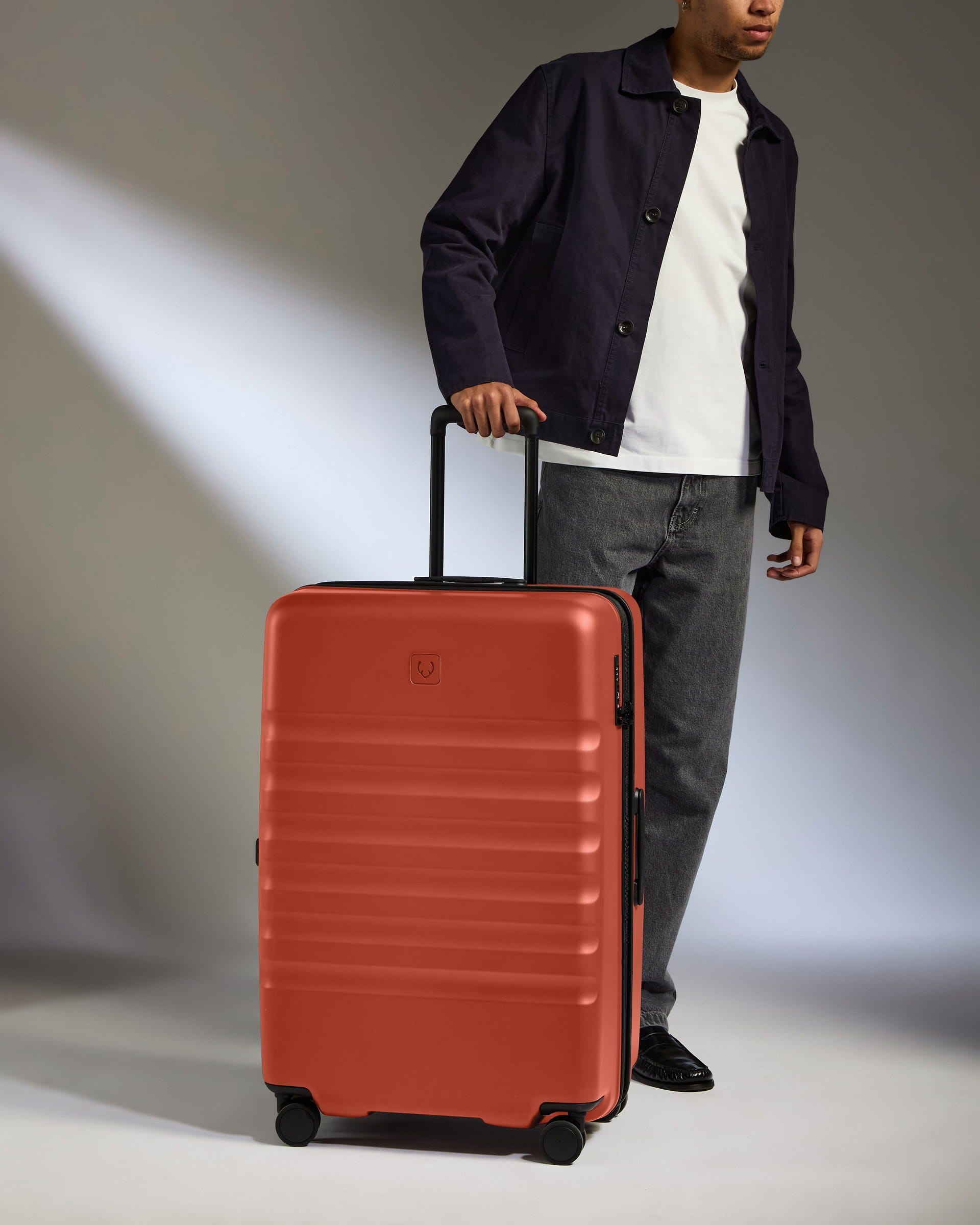 Antler Luggage -  Large Suitcase in Buckthorn Red - Icon Stripe - Hard Suitcase - Large Icon Stripe Large Suitcase in Buckthorn Red | Lightweight & Hard Shell Suitcase