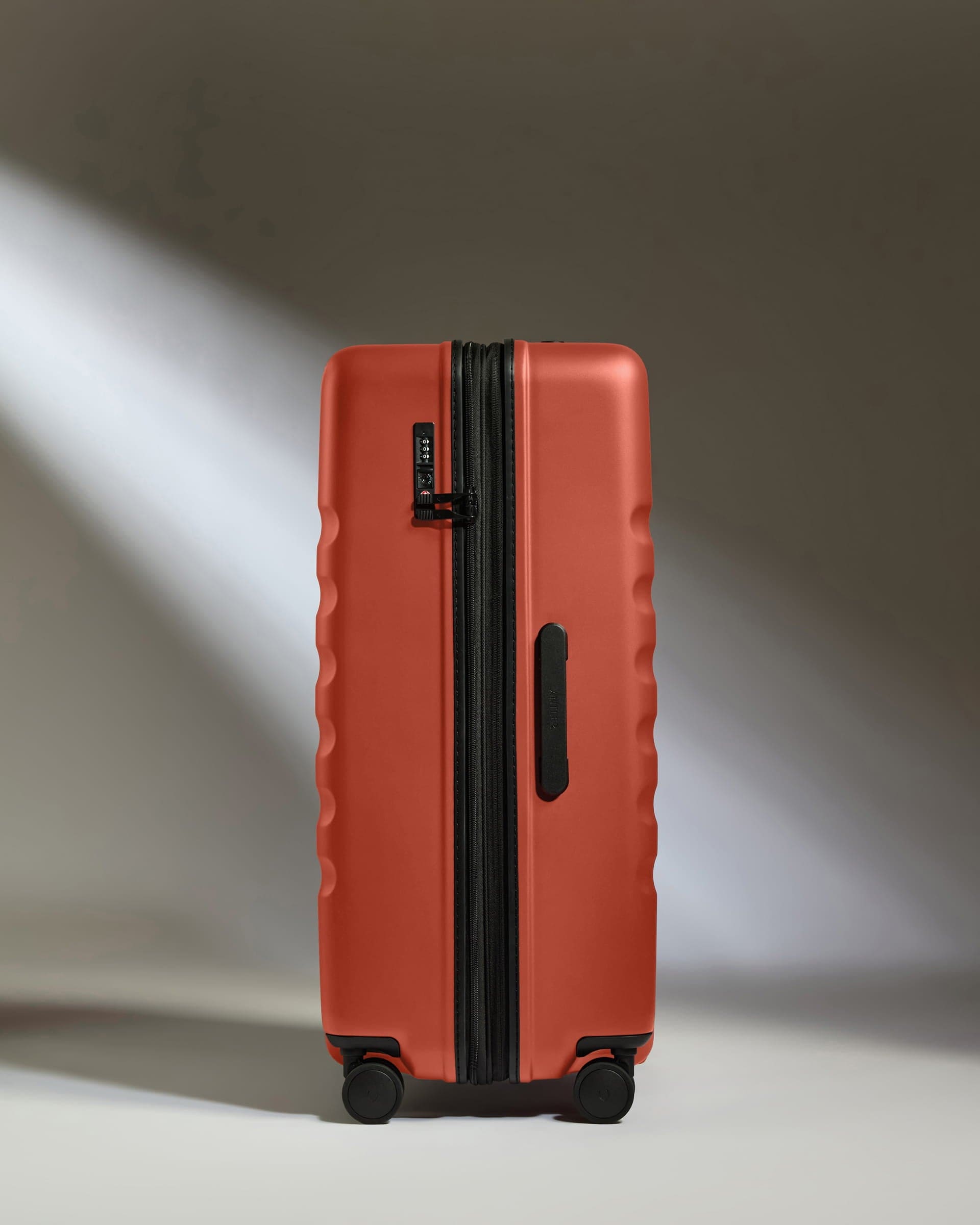 Antler Luggage -  Large Suitcase in Buckthorn Red - Icon Stripe - Hard Suitcase - Large Icon Stripe Large Suitcase in Buckthorn Red | Lightweight & Hard Shell Suitcase