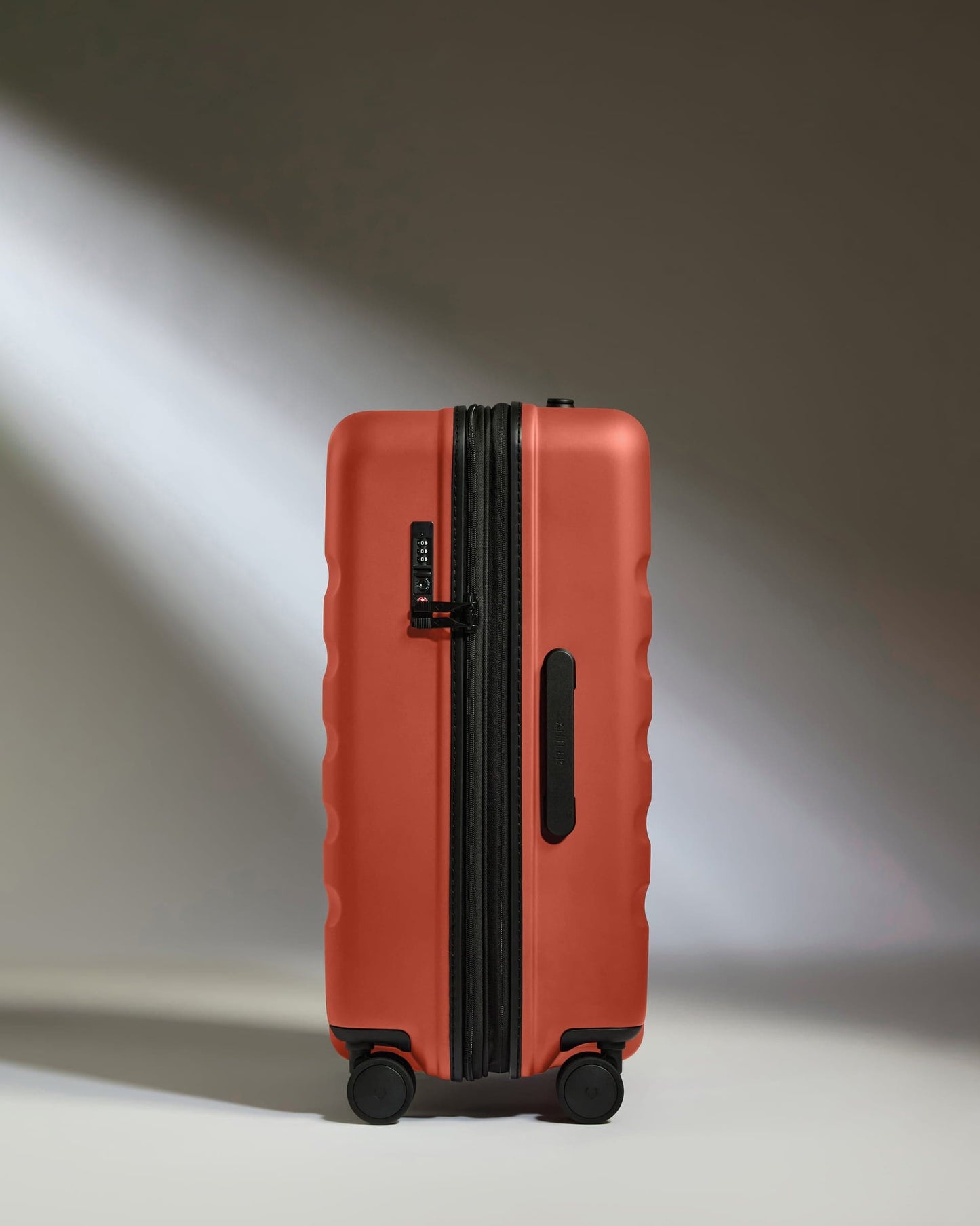 Antler Luggage -  Medium Suitcase in Buckthorn Red - Icon Stripe - Hard Suitcase - Medium Icon Stripe Medium Suitcase in Buckthorn Red | Lightweight & Hard Shell Suitcase