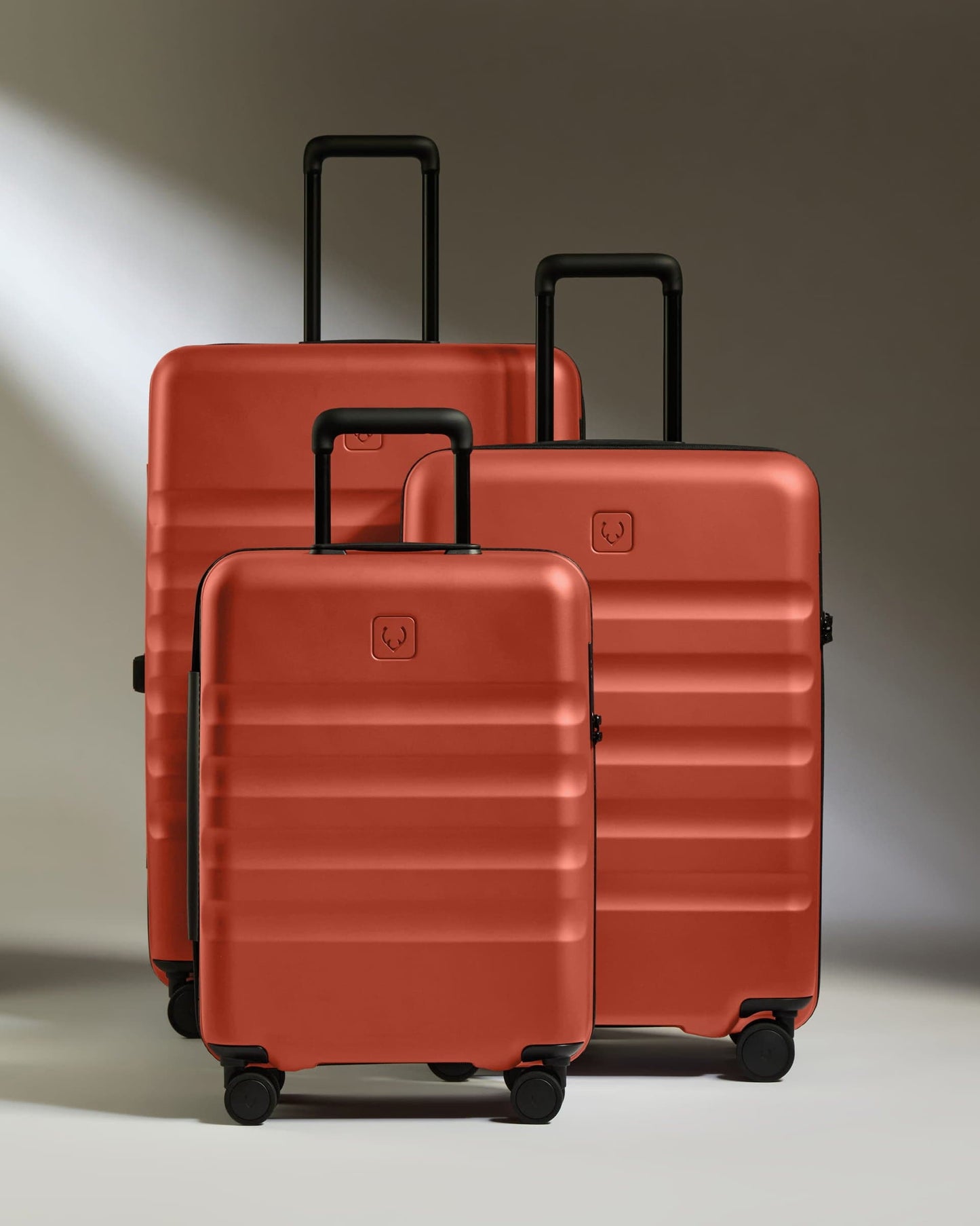 Antler Luggage -  Suitcase Set in Buckthorn Red - Icon Stripe - Hard Suitcase - Standard Cabin Set Suitcase Set in Red - Icon Stripe | Lightweight & Hard Shell Suitcase