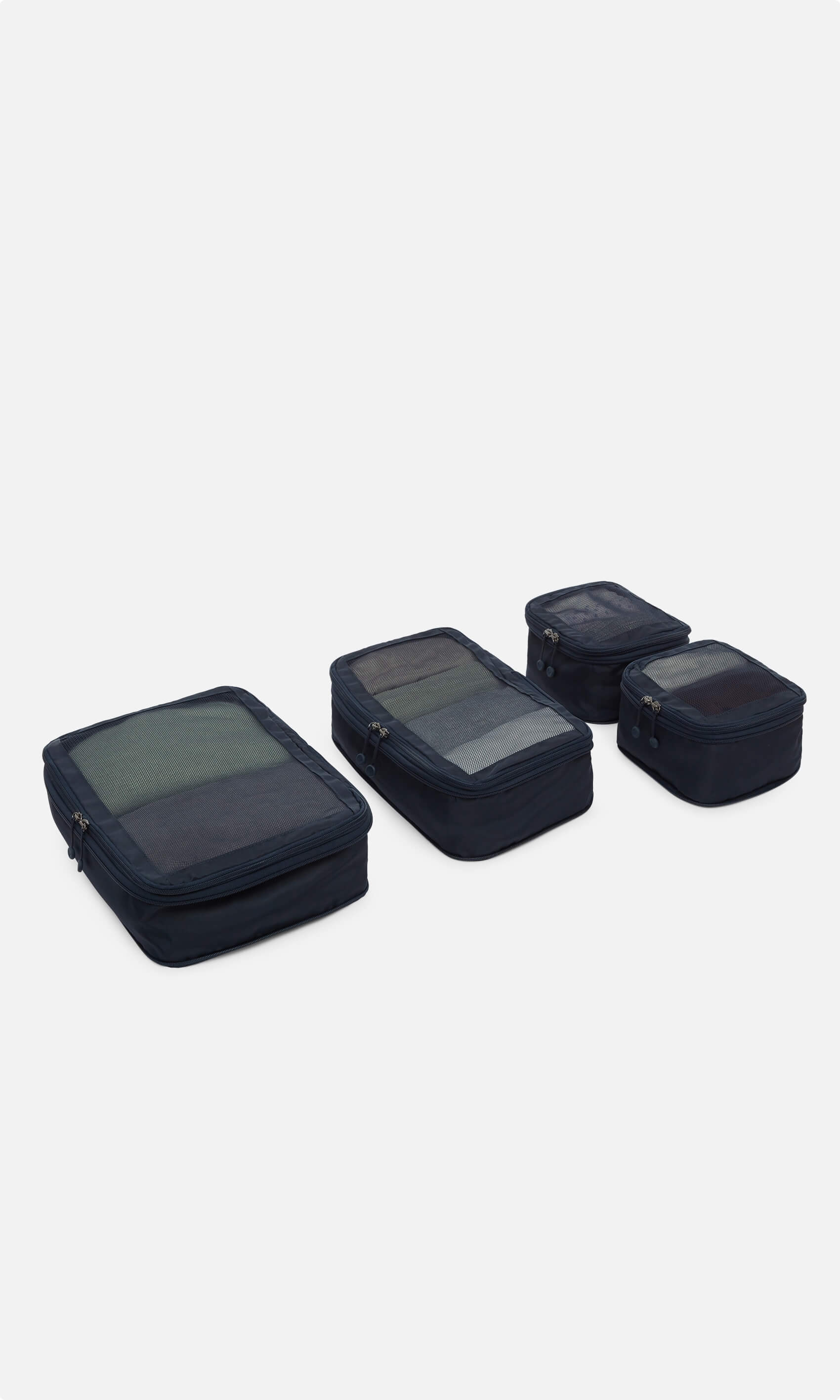 Antler Luggage -  Chelsea 4 packing cubes in navy - Accessories Chelsea 4 Packing Cubes Navy | Travel Accessories | Antler UK