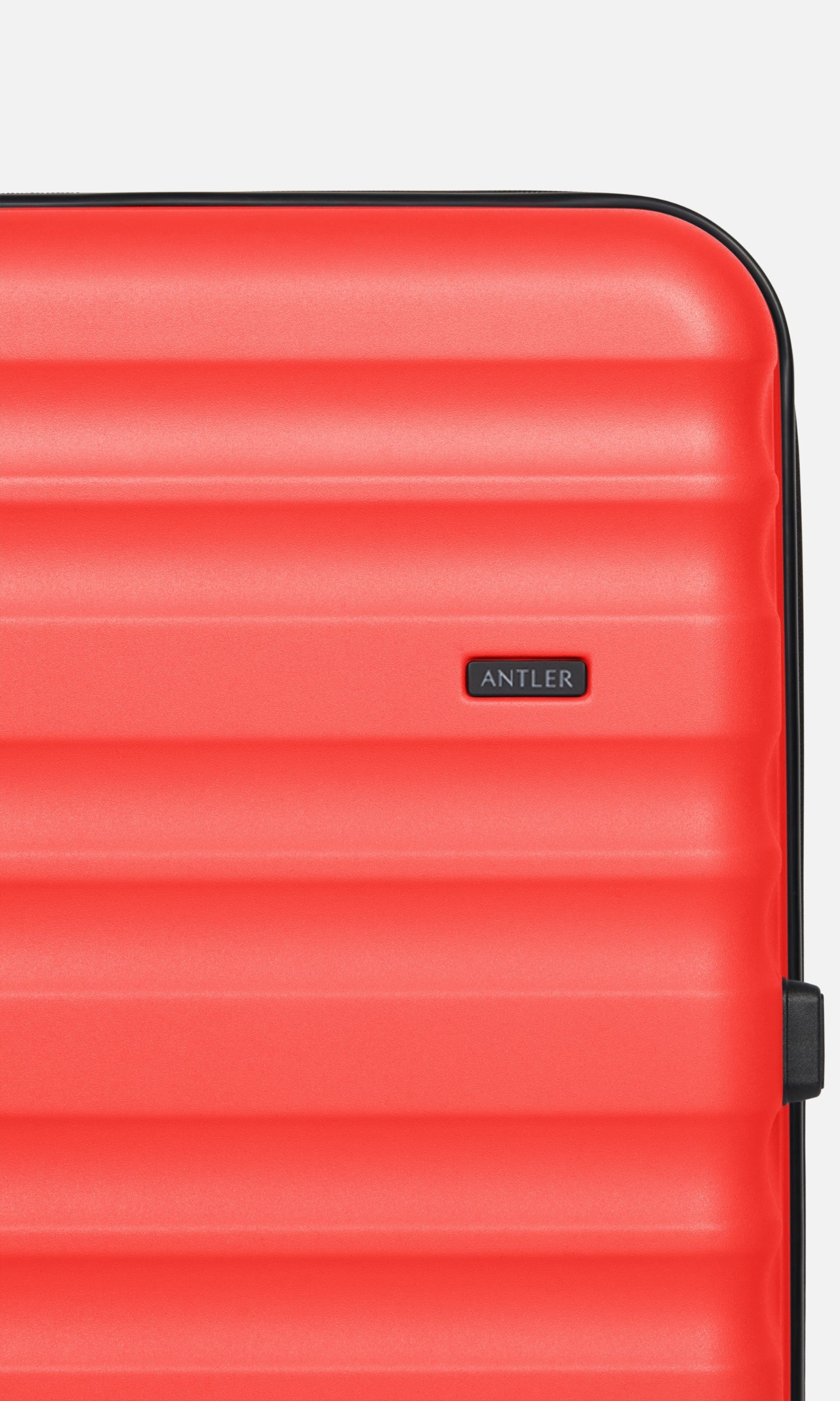 Antler Luggage -  Clifton medium in coral - Hard Suitcases Clifton Medium Suitcase Coral (Red) | Hard Suitcase | Antler UK